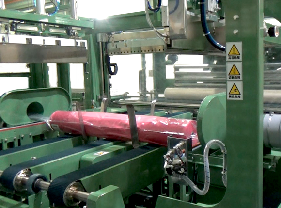 四方シュリンク包装機